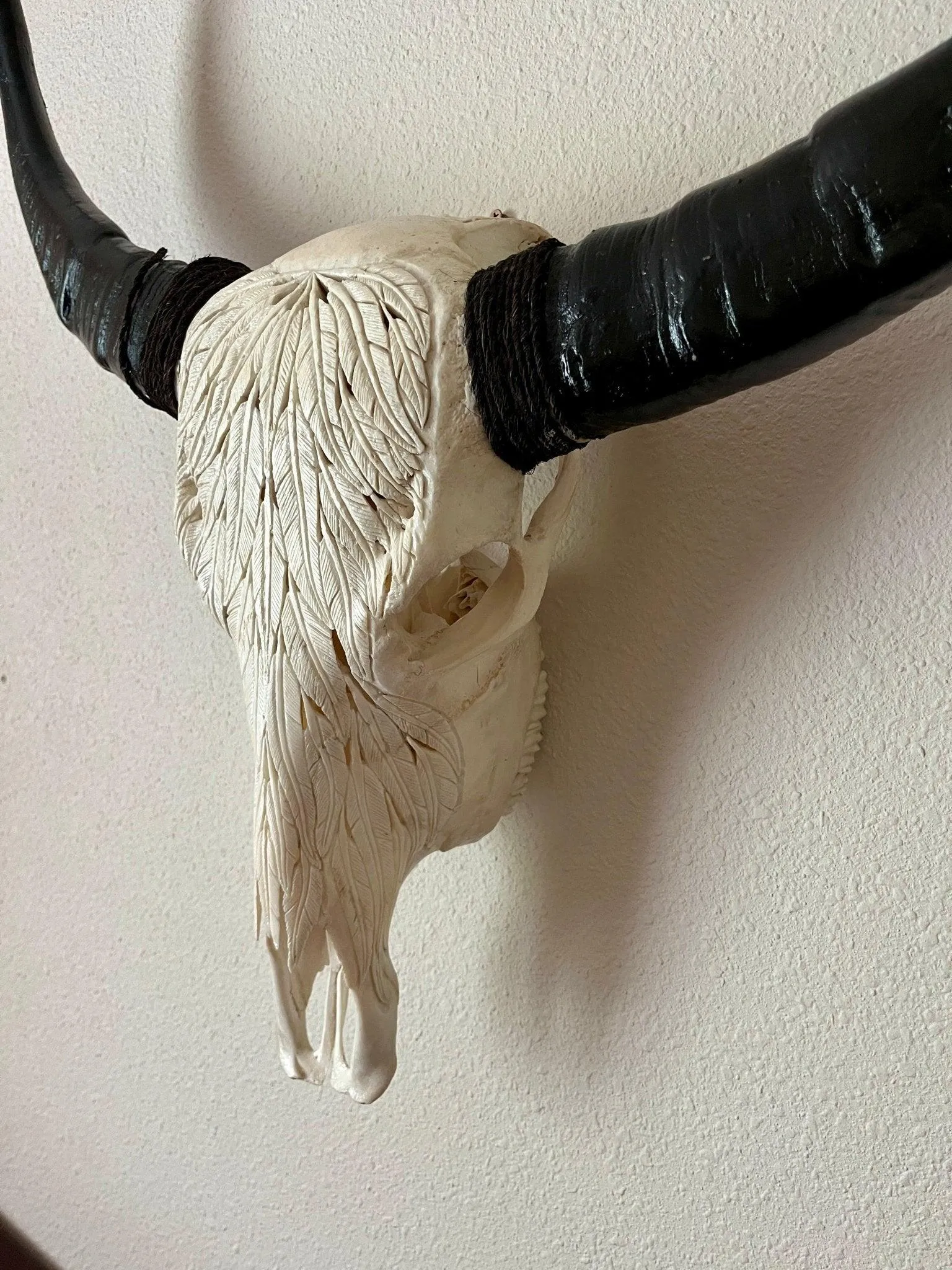 Buffalo Feathers Carved Skull - 2 Colors